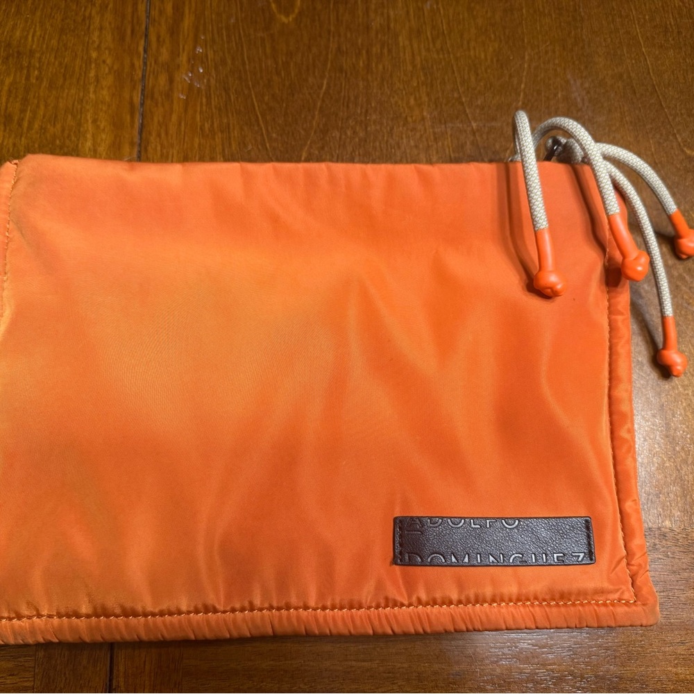 adolfo dominguez orange pouch makeup bag clutch stylish functional trendy